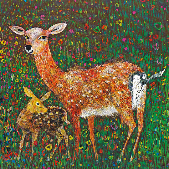 A deer and a doe share a golden mo